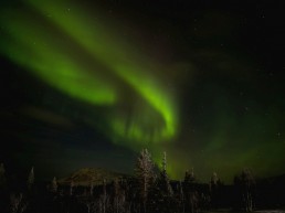 Experience the magic of Northern lights at Lapland when you stay at hotel or hostel Kuerkievari at Ylläs